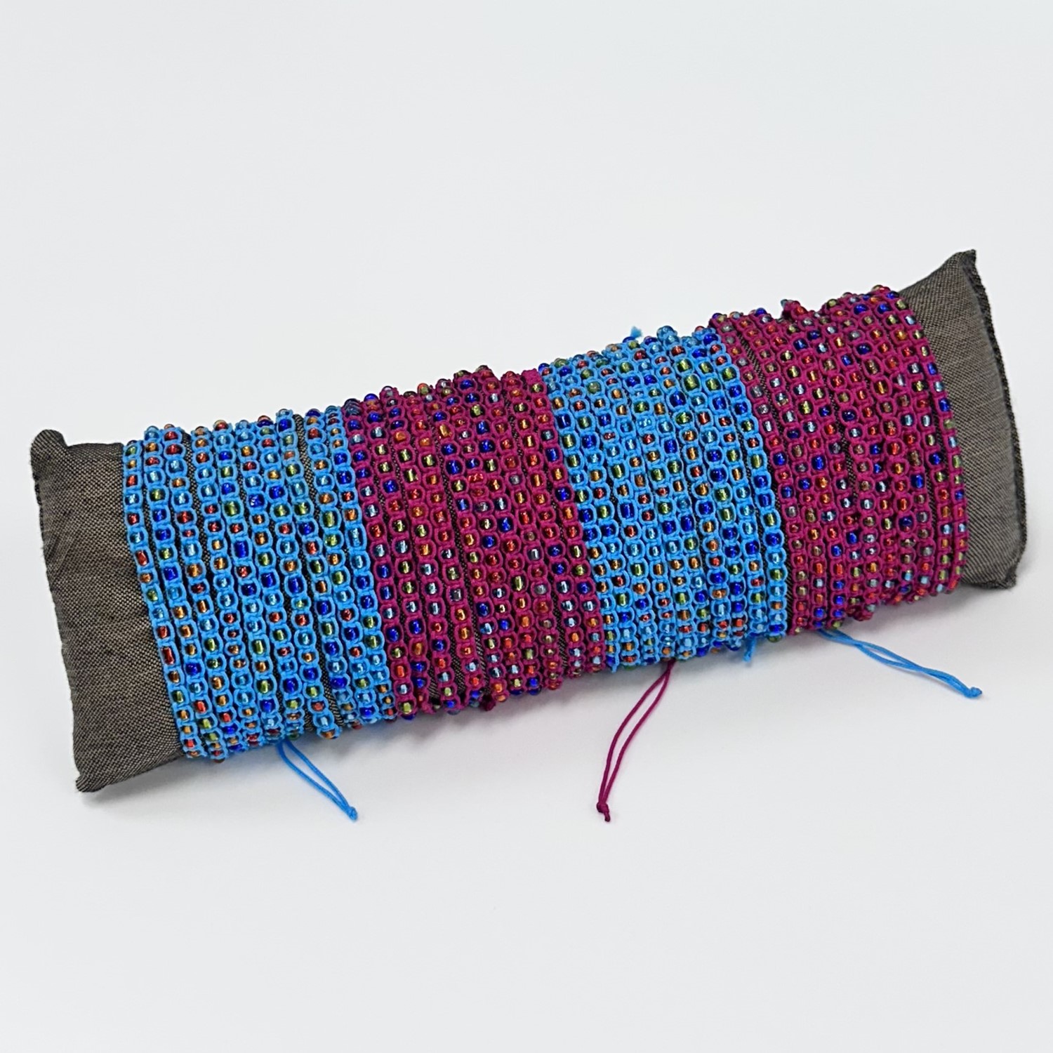 Fiesta Rhythms Woven Rainbow Bali Glass Bead Pull Bracelets 31504